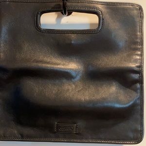 Black clutch by Coach